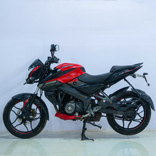 Black Bajaj NS 160 motorcycle with sporty design and sleek body, viewed from the side.
