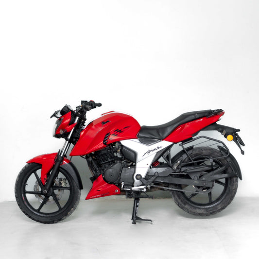 Used TVS Apache RTR 160 red left side view in Gurgaon sporty commuter bike good condition