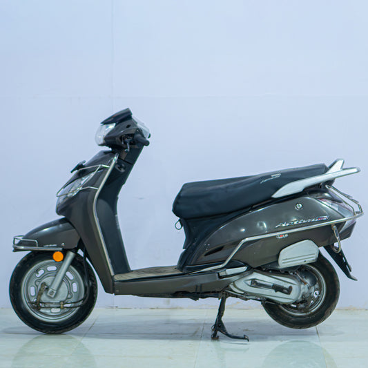 Honda Activa 125 scooter by BikeDilwado, front view showing its modern design and headlight details.