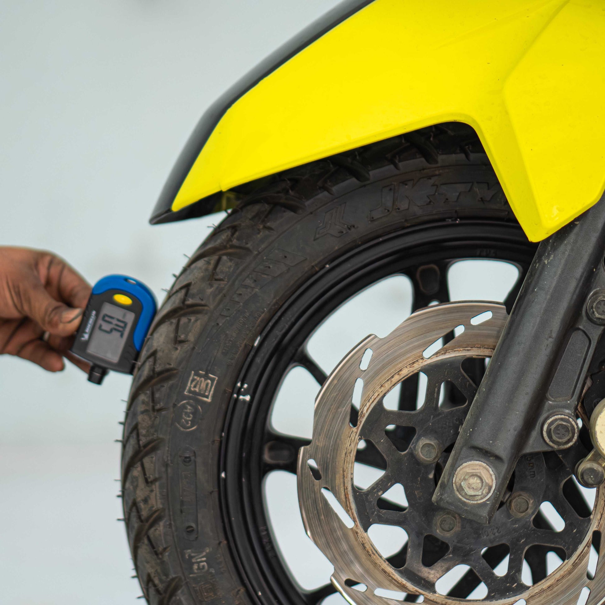 TVS Ntorq 125 front tyre condition used scooter Gurgaon tread inspection close up