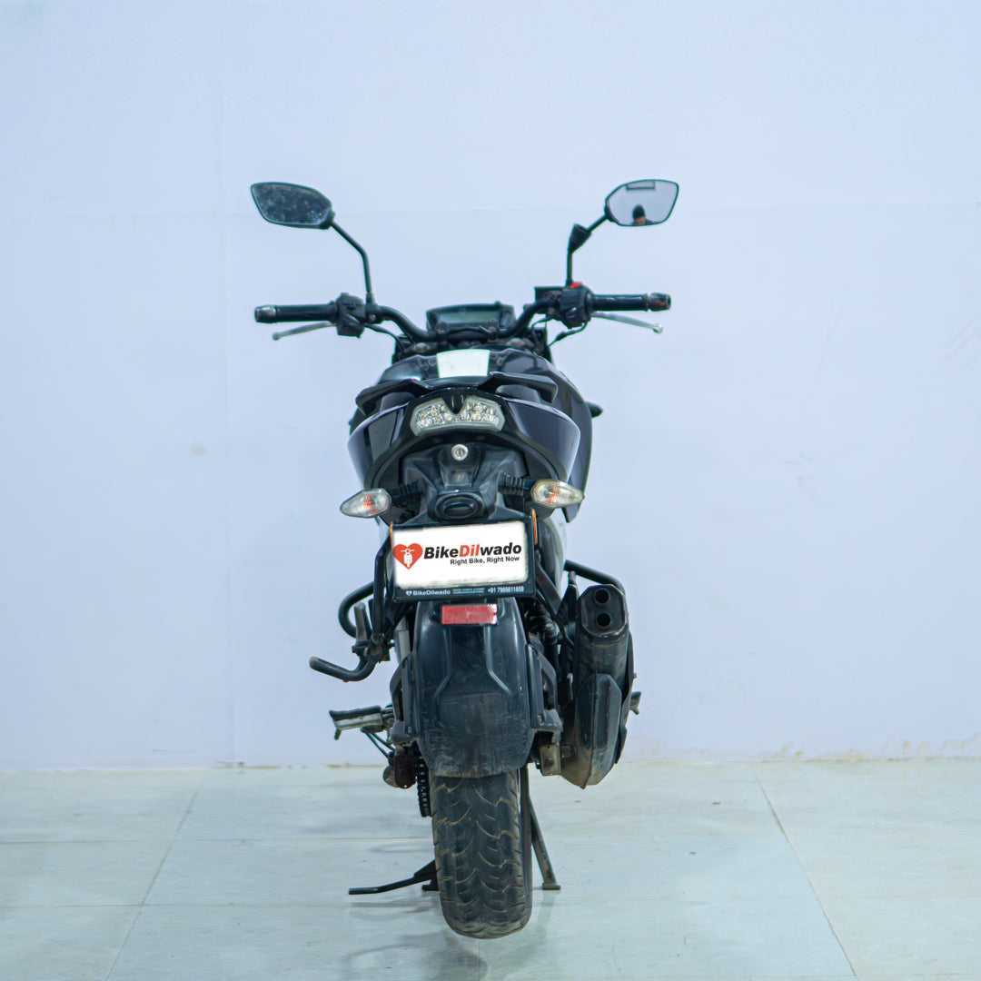 TVS Apache 160 4V motorcycle with sleek design and sporty features, shown in a side view.