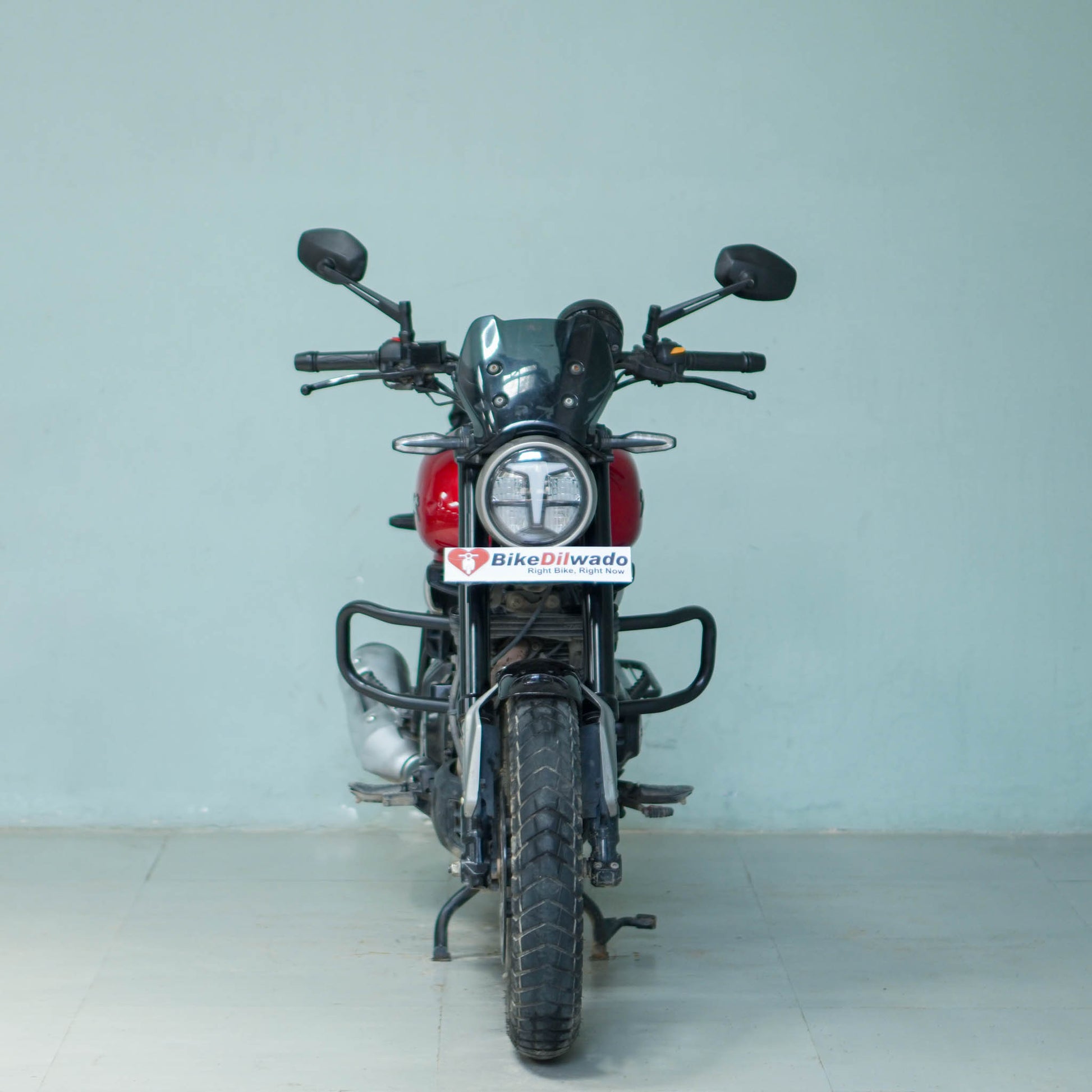 TVS Ronin motorcycle from BikeDilwado, showing a sleek black and silver design with modern headlights and stylish bodywork.