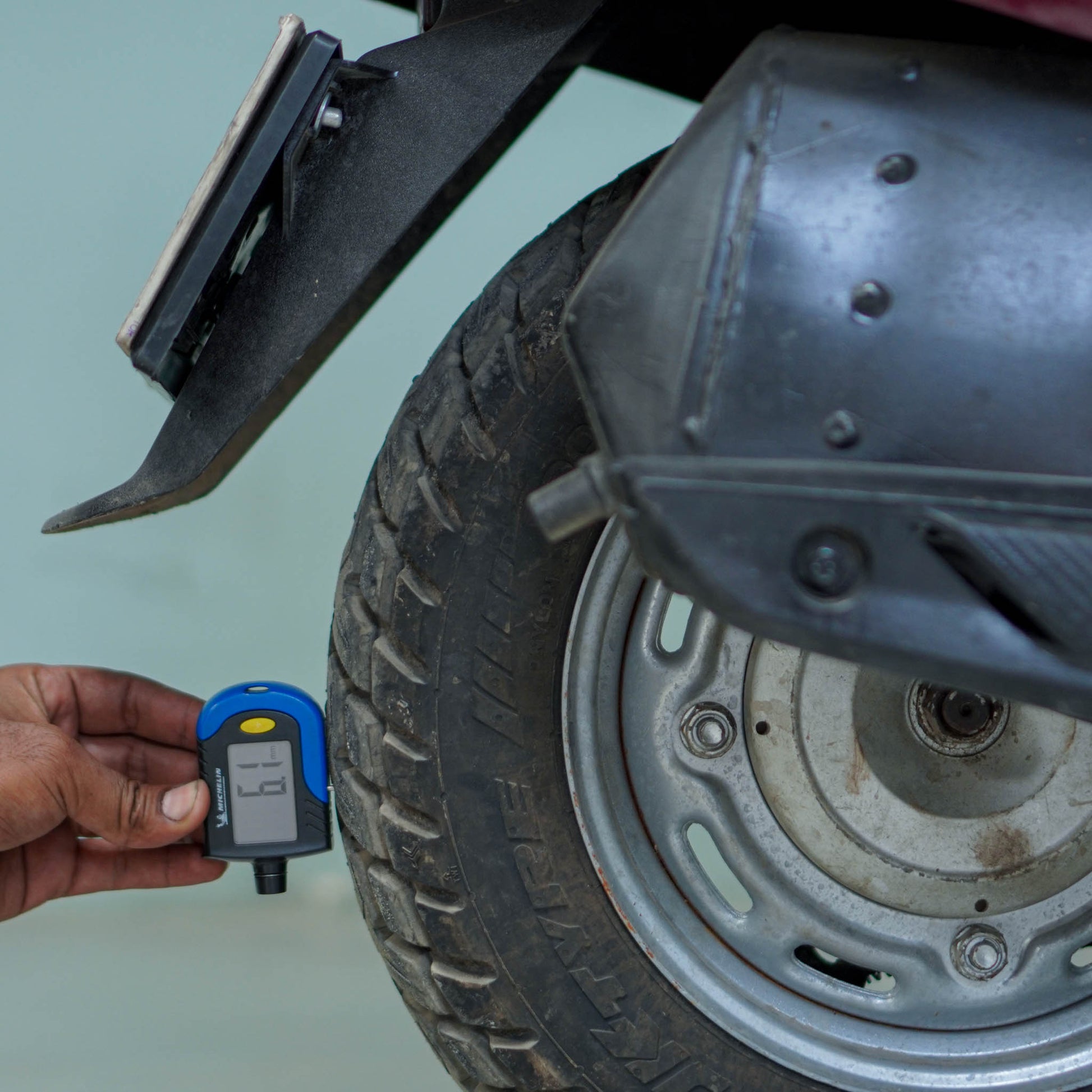Honda Activa 125 scooter in blue color with sleek design and digital instrument panel, featuring comfortable seat and modern styling.