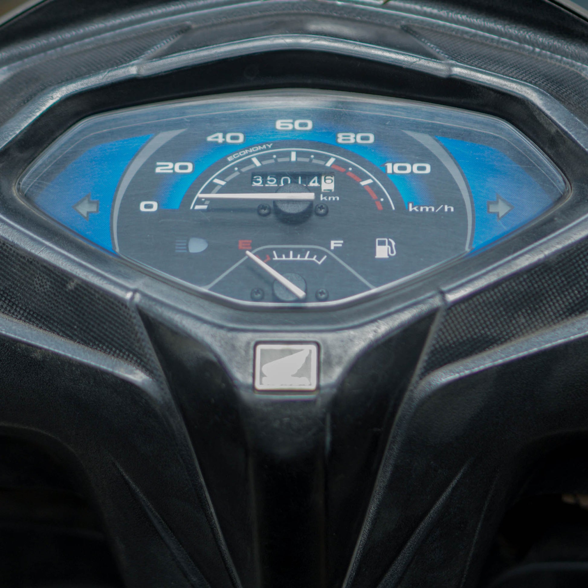 Honda Activa 4G scooter parked on a street, showcasing its sleek design and modern features.