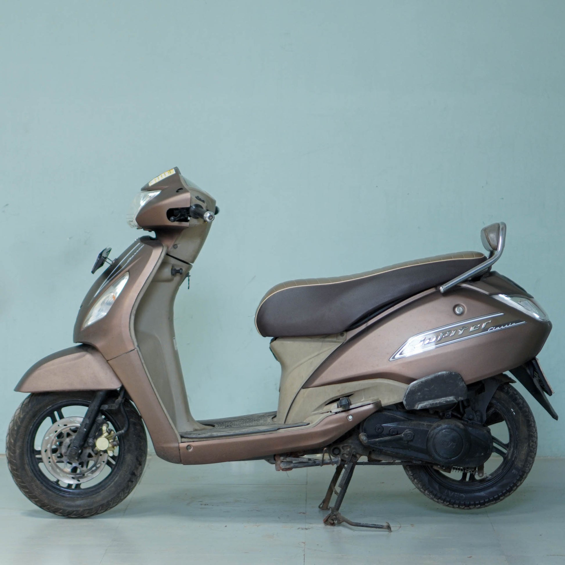 TVS Jupiter Classic scooter from BikeDilwado with a sleek design and modern features, shown in a front-side view.