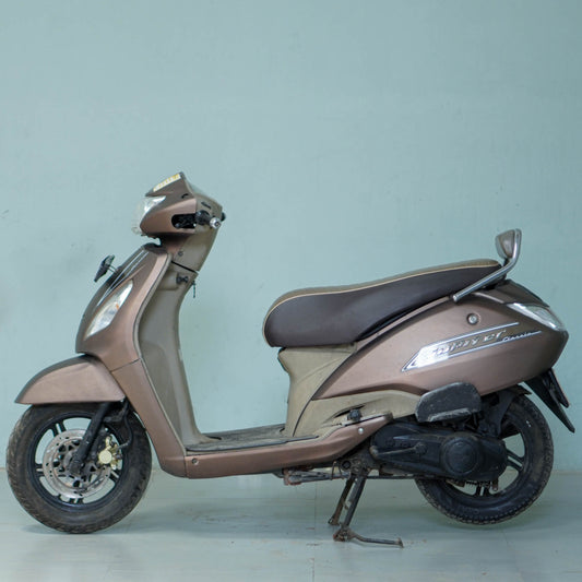 TVS Jupiter Classic scooter from BikeDilwado with a sleek design and modern features, shown in a front-side view.