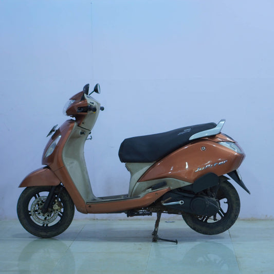 TVS Jupiter 125 scooter in black with chrome accents, showcasing a side view with stylish design and comfortable seating.