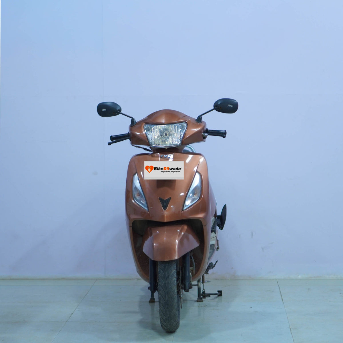 TVS Jupiter 125 scooter in a vibrant color with sleek design, showcasing the modern body and comfortable seating.
